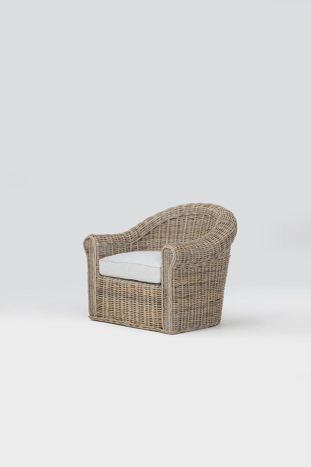 NovaSolo Wickerworks Aegean Chair, Natural Grey, studio view